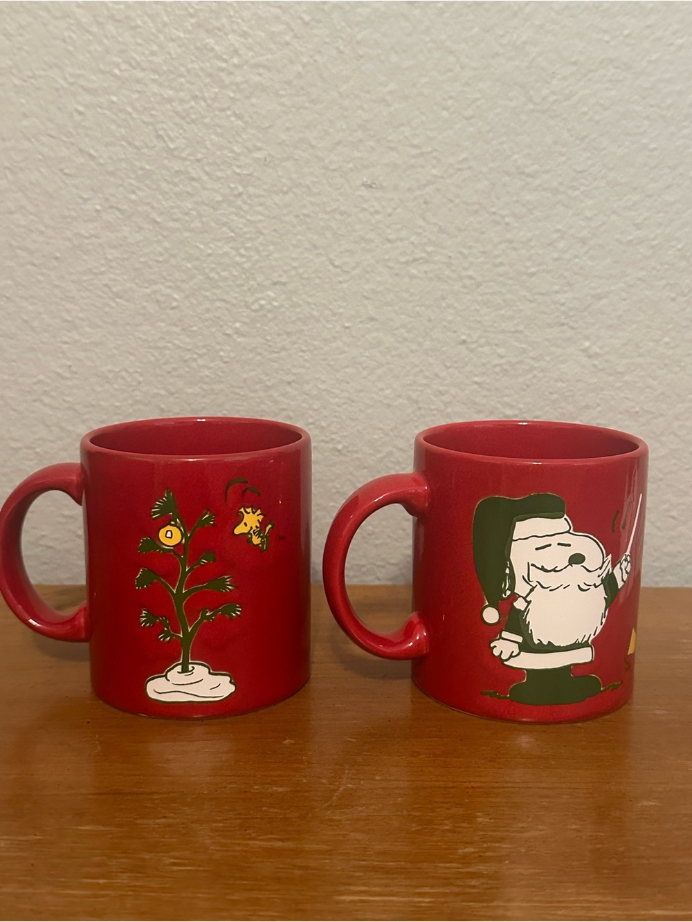 Two vintage Waechtersbach Peanuts snoopy Christmas red mugs